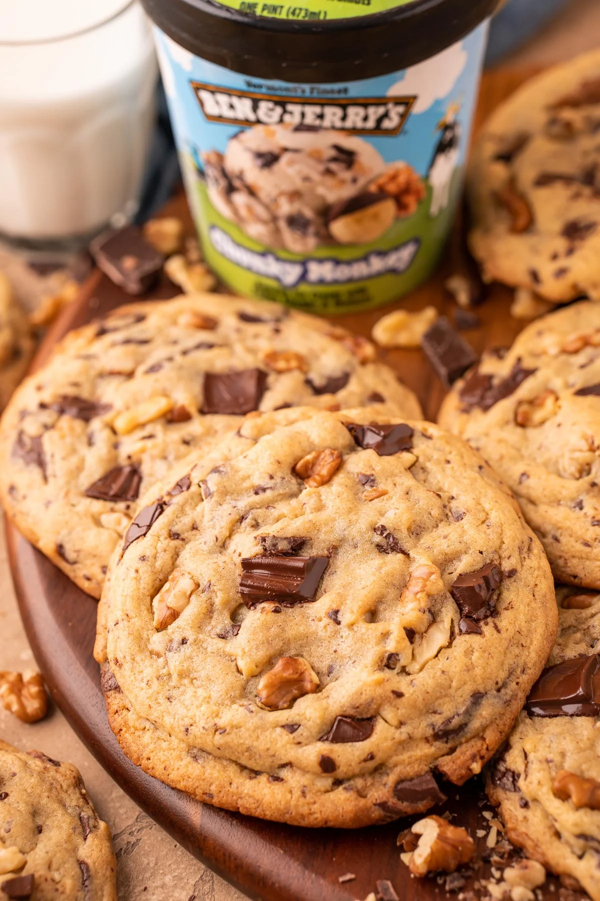 Close up photo of Chunky Monkey Pudding Cookies on a board.