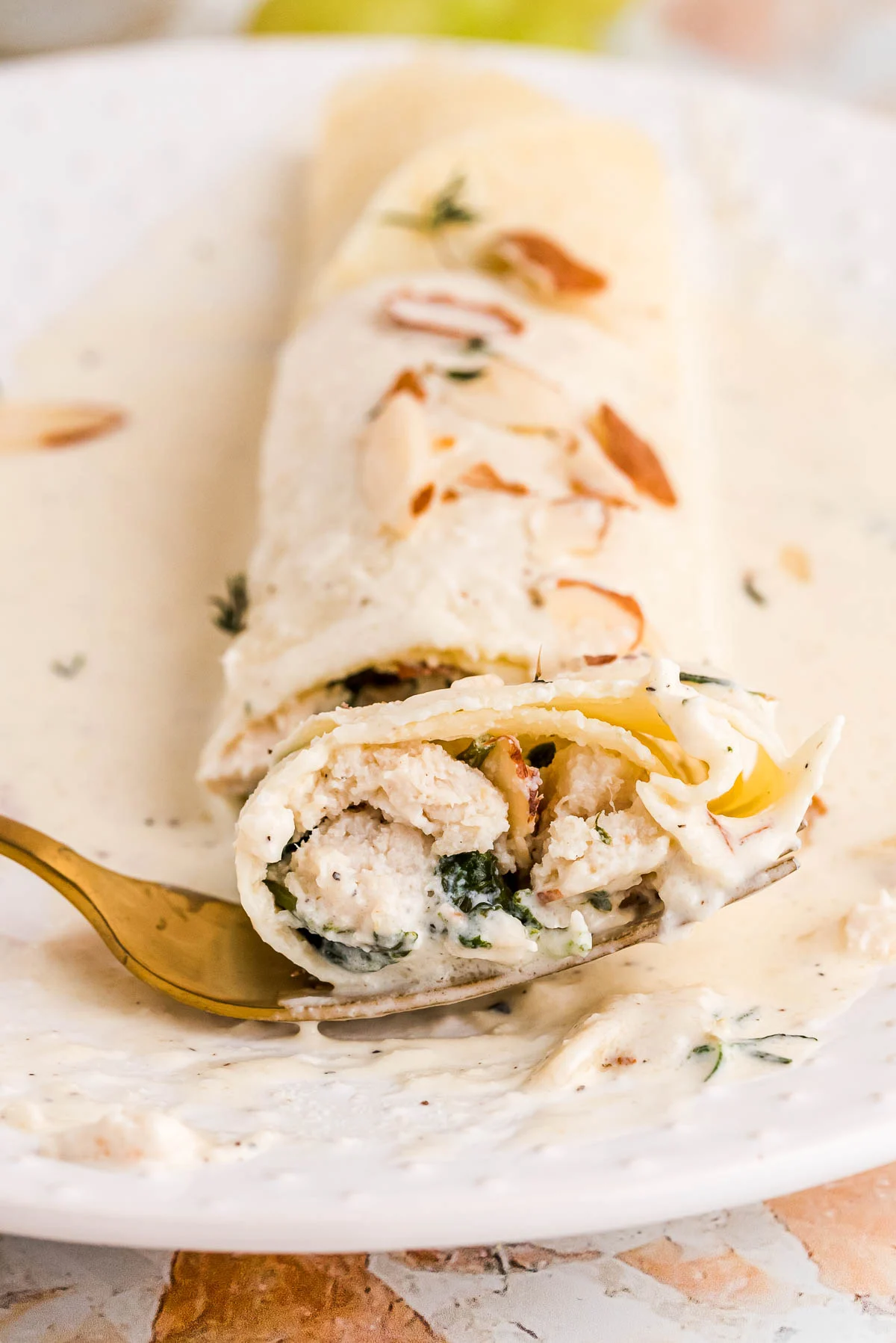 Spinach and Chicken Crepes with White Wine Cream Sauce