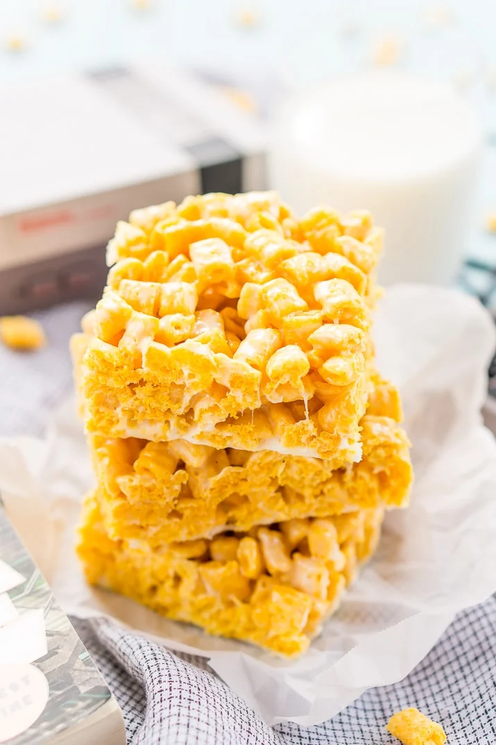 These Cap'n Crunch Treats are a fun twist on classic rice krispies treats and inspired by the book Ready Player One by Ernest Cline. They're the perfect fast dessert or afternoon snack and Cap'n Crunch lovers will go crazy over them!