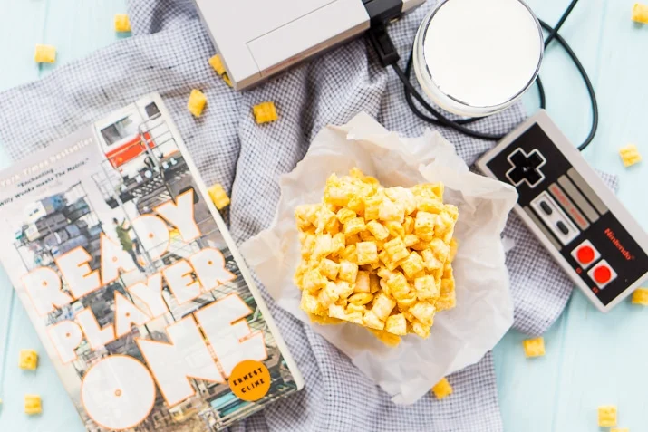 These Cap'n Crunch Treats are a fun twist on classic rice krispies treats and inspired by the book Ready Player One by Ernest Cline. They're the perfect fast dessert or afternoon snack and Cap'n Crunch lovers will go crazy over them!