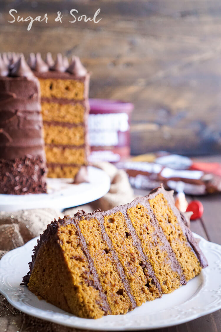 This Chocolate Pumpkin Cake is the ultimate pumpkin and chocolate combo for fall! Five layers of sweet and fluffy pumpkin cake wrapped in a whipped chocolate buttercream frosting!