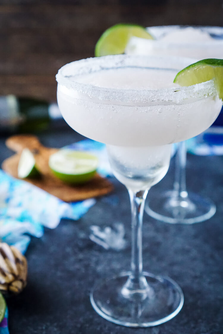 These Frozen Champagne Margaritas are a fun blend of silver tequila, bubbly champagne, limes, and ice! They're perfect for New Year's Eve, Cinco de Mayo, or any occasion where you just want a cocktail that's refreshing and delicious!