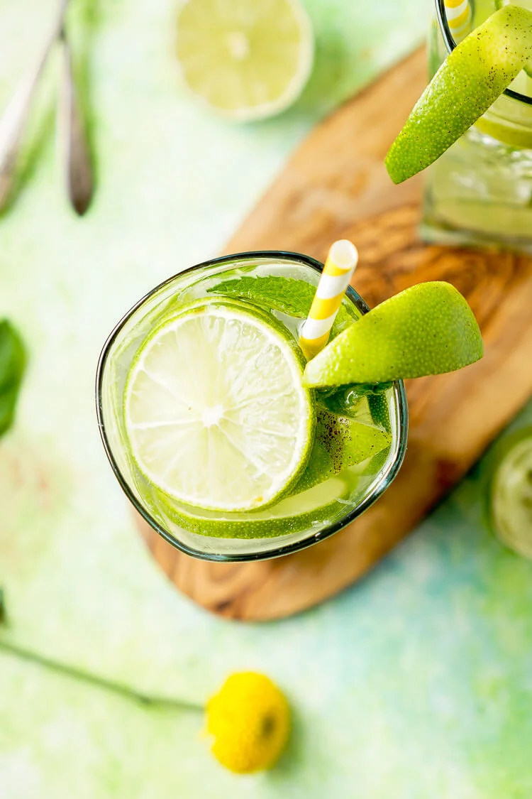 This Mojito Water is a refreshing infused water with bright limes and cool mint - make it in minutes!