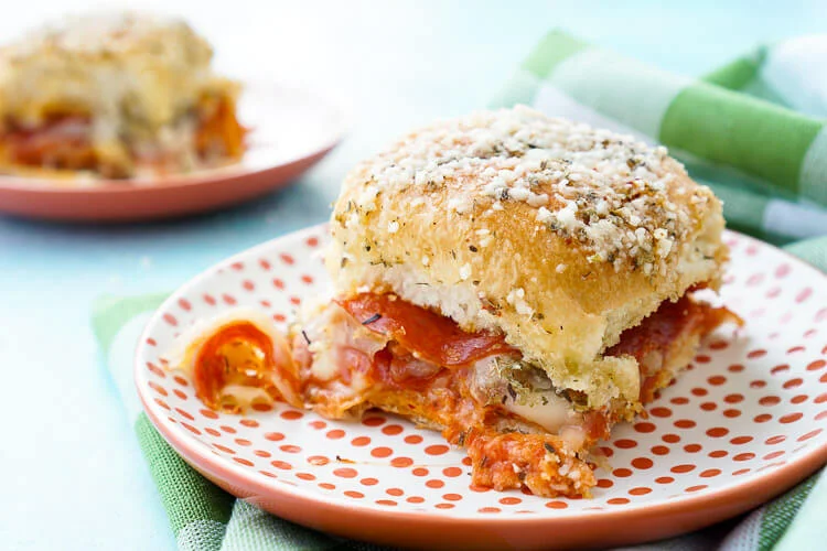 These Easy Pizza Sliders are so simple to make and are sure to be a family favorite!