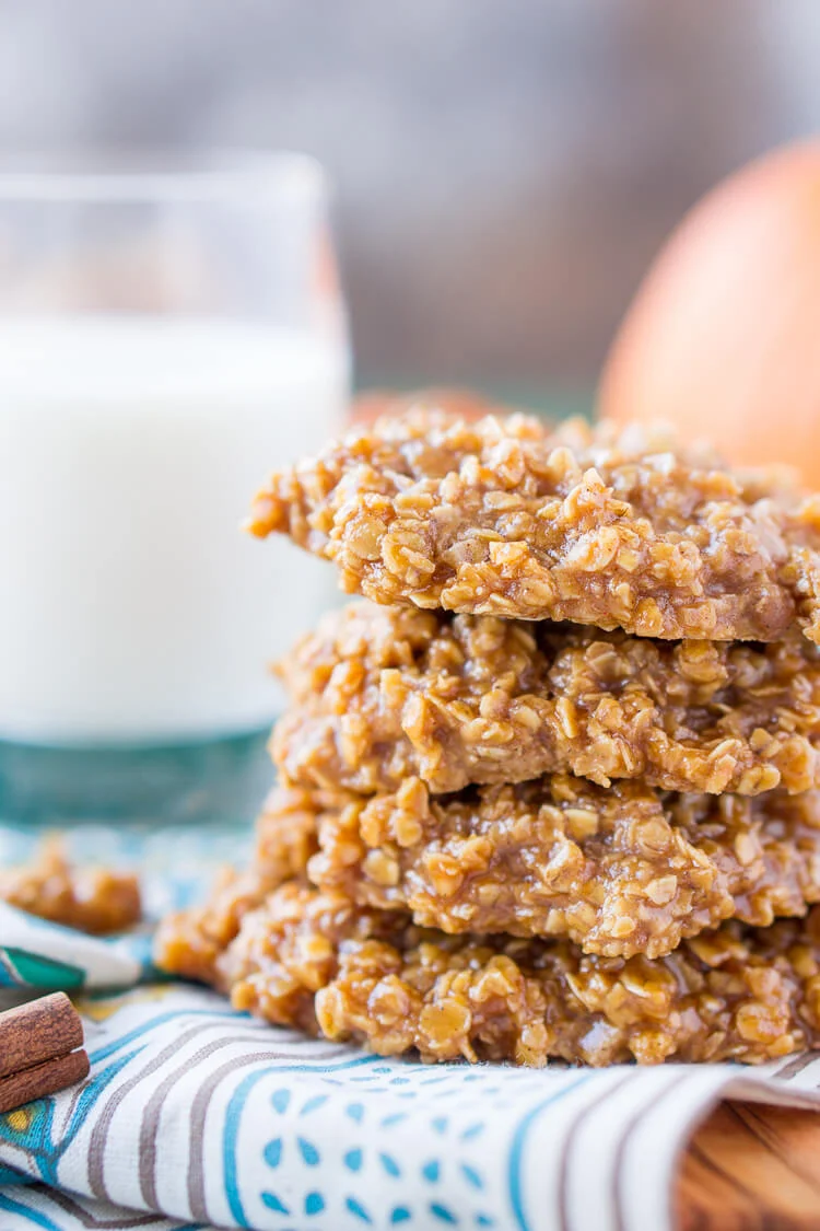 These Pumpkin No Bake Cookies are crazy delicious and so simple to make! Made with oatmeal, pumpkin spice pudding mix, sugar, butter, and more, these cookies will be a hit at home, the office, or a party! Don't let fall pass you by without making a batch!