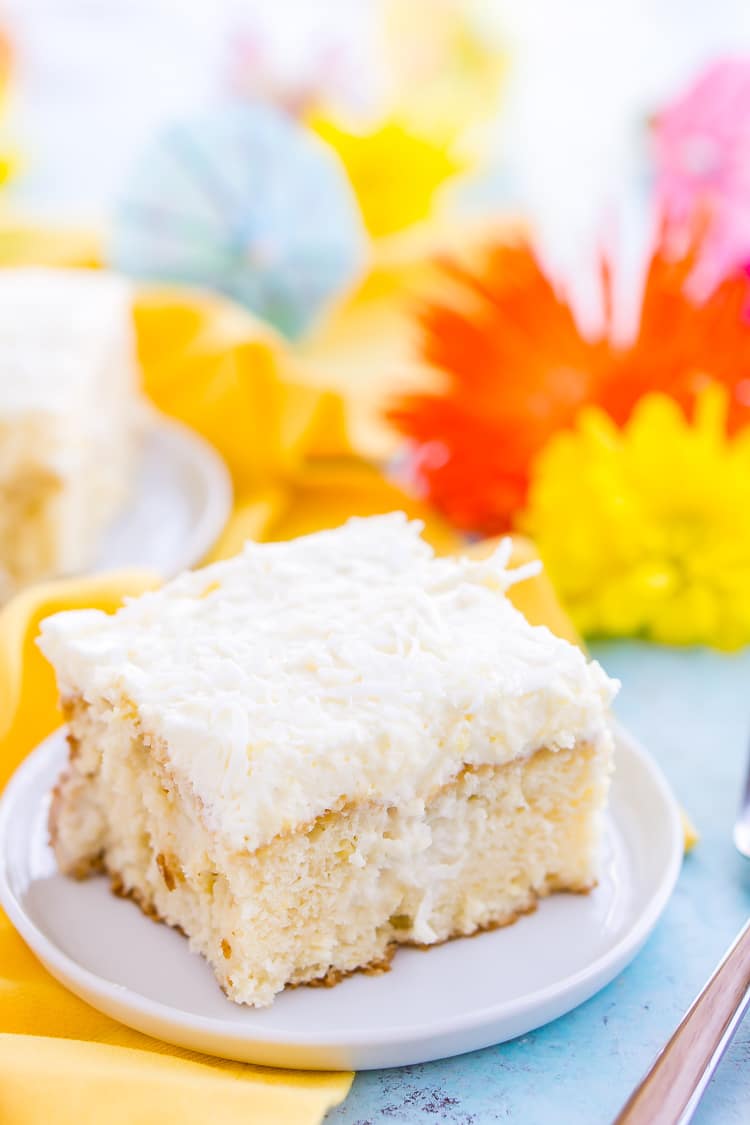 This Coconut Poke Cake is easy to make, loaded with coconut flavor, and the perfect dessert for your spring and summer celebrations.