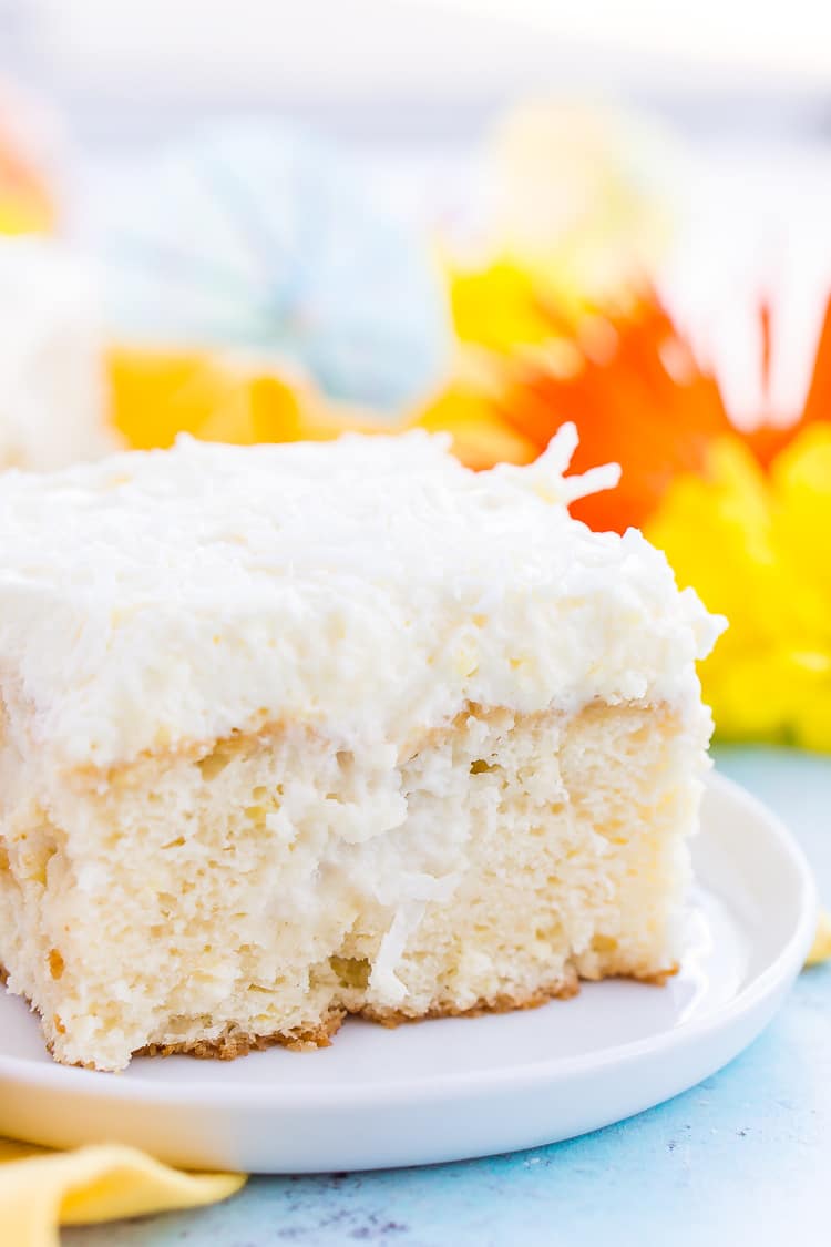 This Coconut Poke Cake is easy to make, loaded with coconut flavor, and the perfect dessert for your spring and summer celebrations.
