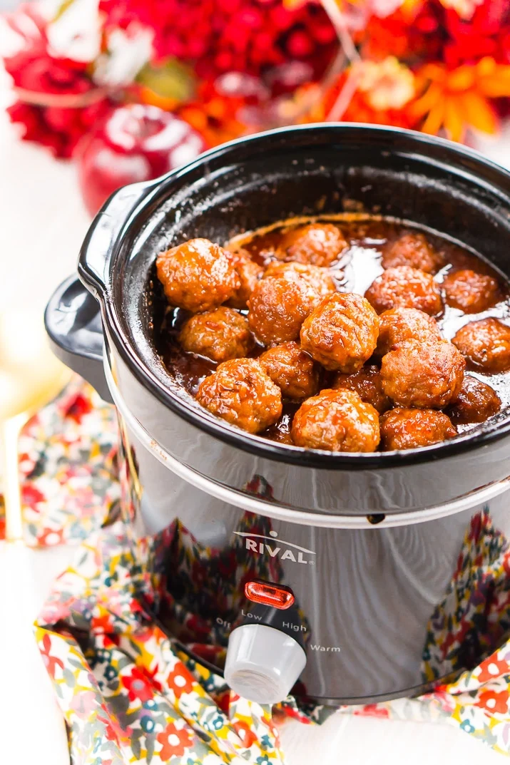 These Apple Cocktail Meatballs are an easy party food appetizer that's made in the slow cooker and loaded with flavors that will tantalize your taste buds!