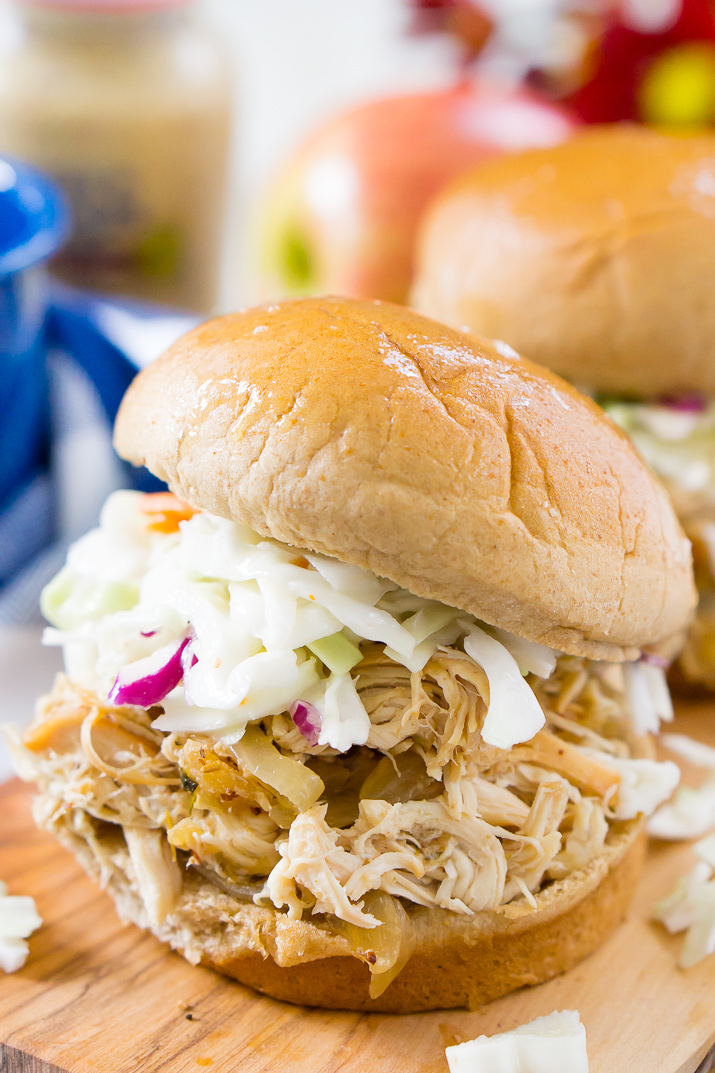 This Apple Cider Pulled Chicken is Weight Watchers approved and so easy to make! You can turn it into sandwiches, tacos, sliders, or serve it over rice!