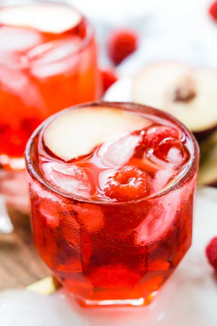 A Red Russian Cocktail is made with equal parts cherry liqueur and vodka over ice. Serve it up in a punch bowl for parties or serve it in short glasses for individual cocktails.