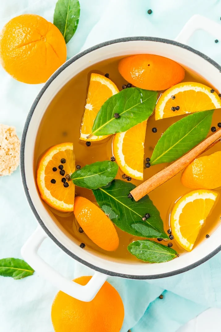 This Turkey Brine recipe made with salt, oranges, bay leaves, cinnamon, brown sugar, and black pepper will add moisture, tenderness, and flavor to your turkey. Brine turkey for 12 to 24 hours for the most amazing turkey for your holiday gathering!