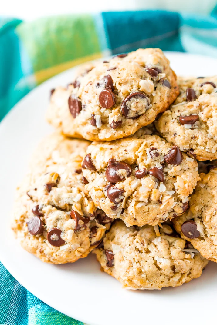 Oatmeal Chocolate Chip Lactation Cookies on a white plate with blue napkin.