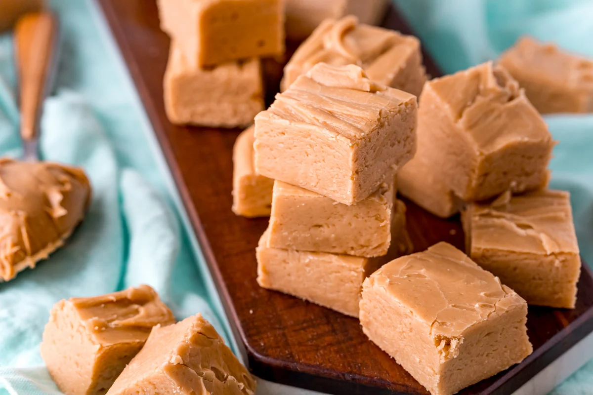 This Easy Peanut Butter Fudge is a simple recipe to make and is the perfect balance of sweet and salty. It's soft and creamy and great for the holidays and special occasions or just because!